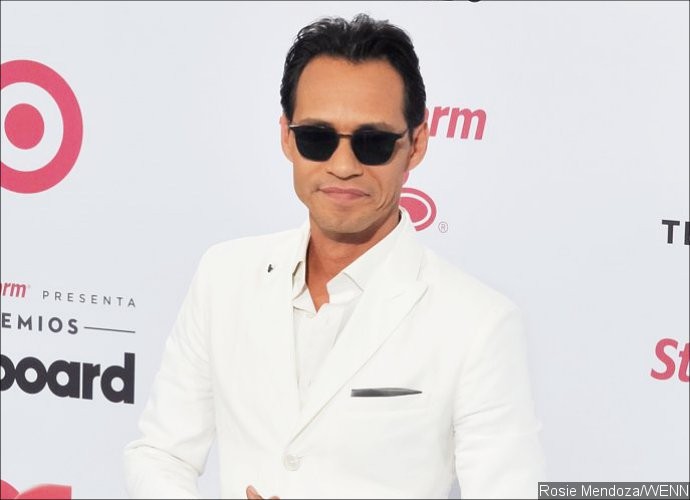 Marc Anthony Makes First Red Carpet Appearance With Girlfriend Mariana Downing
