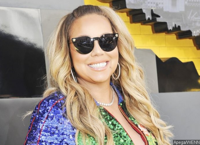 Mariah Carey Flashes Her Nipple and Crotch in Tight Leather Mini Dress