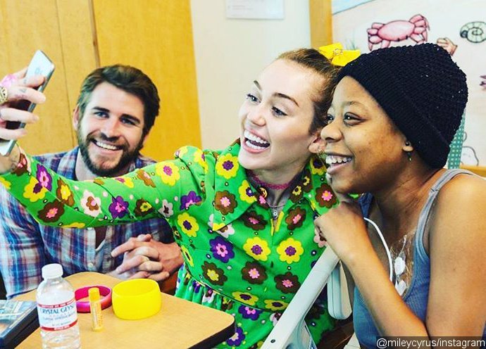 Miley Cyrus and Liam Hemsworth Surprise Young Fans at Children's Hospital