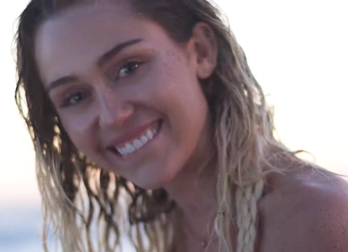 Miley Cyrus Dedicates 'Malibu' to Liam Hemsworth, Hits Beach in Music Video