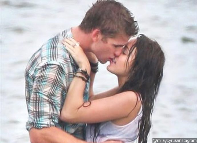 Miley Cyrus Shares Throwback Photo of Her 'First Smooch' With Liam Hemsworth