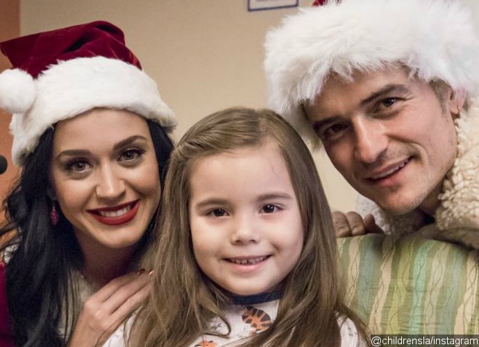 Orlando Bloom and Katy Perry Dress as Mr. and Mrs. Claus to Visit Children at Hospital