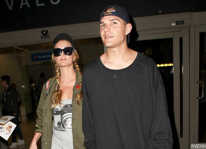 Paris Hilton Caught Locking Lips With New Beau Chris Zylka at Hollywood Event