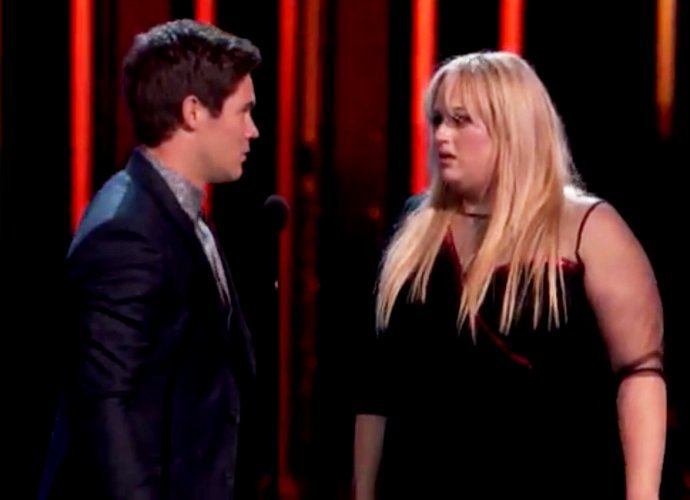 Watch Rebel Wilson and Adam DeVine Passionately Making Out at 2016 MTV Movie Awards