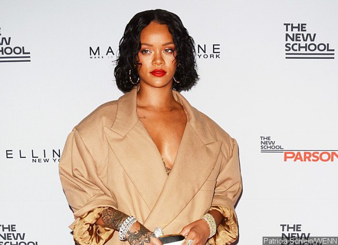 Rihanna Caught Making Out With Mystery Man in Spain