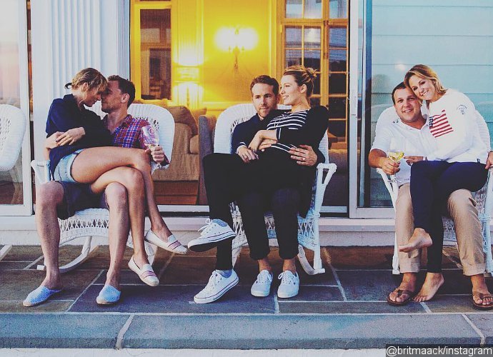Taylor Swift Sits on Tom Hiddleston's Lap in Cute Pic With Blake Lively and Ryan Reynolds