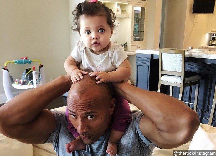 The Rock's Little Daughter Poops on His Neck While He's Giving Advice to Her
