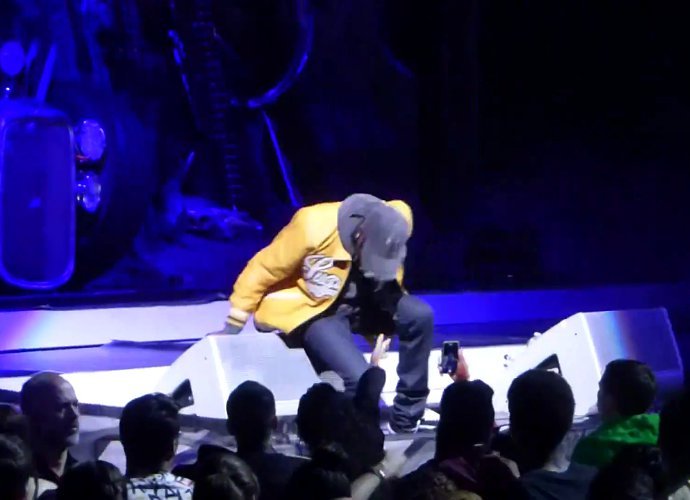 That Looks Painful! Watch Travis Scott Fall Offstage While Opening for Rihanna
