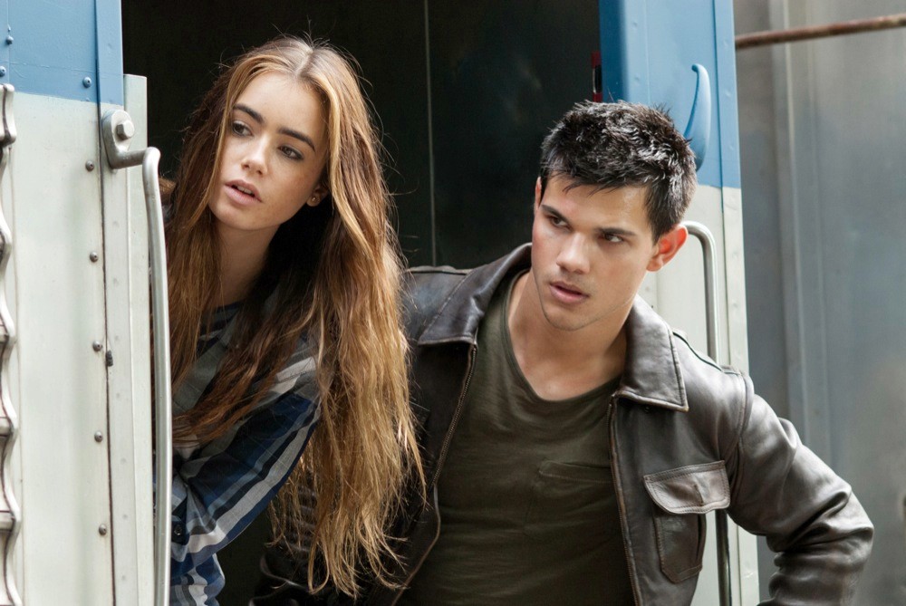 Lily Collins stars as Karen and Taylor Lautner stars as Nathan in Lionsgate Films' Abduction (2011)
