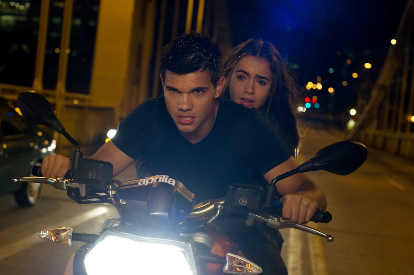 Taylor Lautner stars as Nathan and Lily Collins stars as Karen in Lionsgate Films' Abduction (2011)