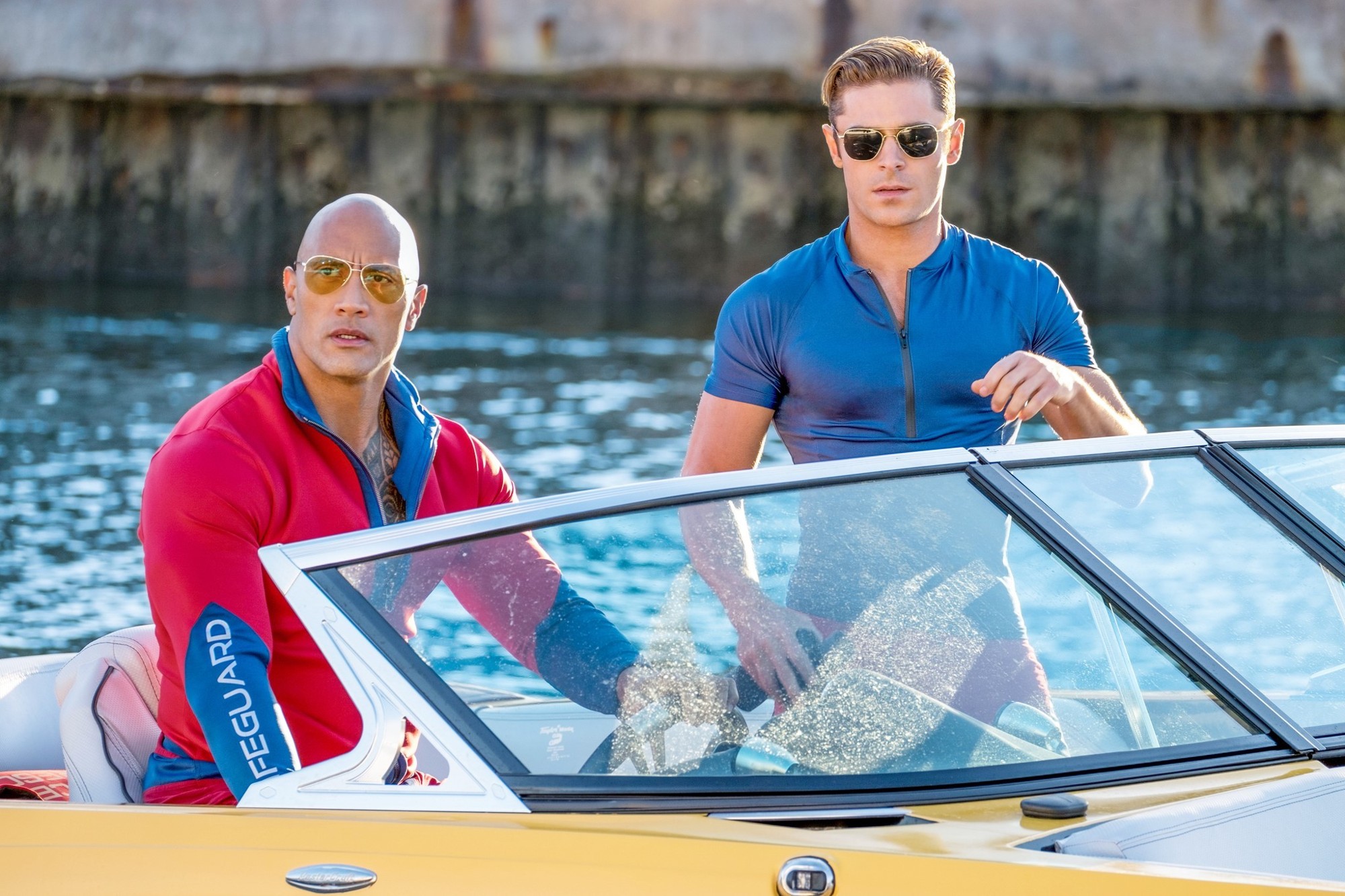The Rock stars as Mitch Buchannon and Zac Efron stars as Matt Brody in Paramount Pictures' Baywatch (2017)