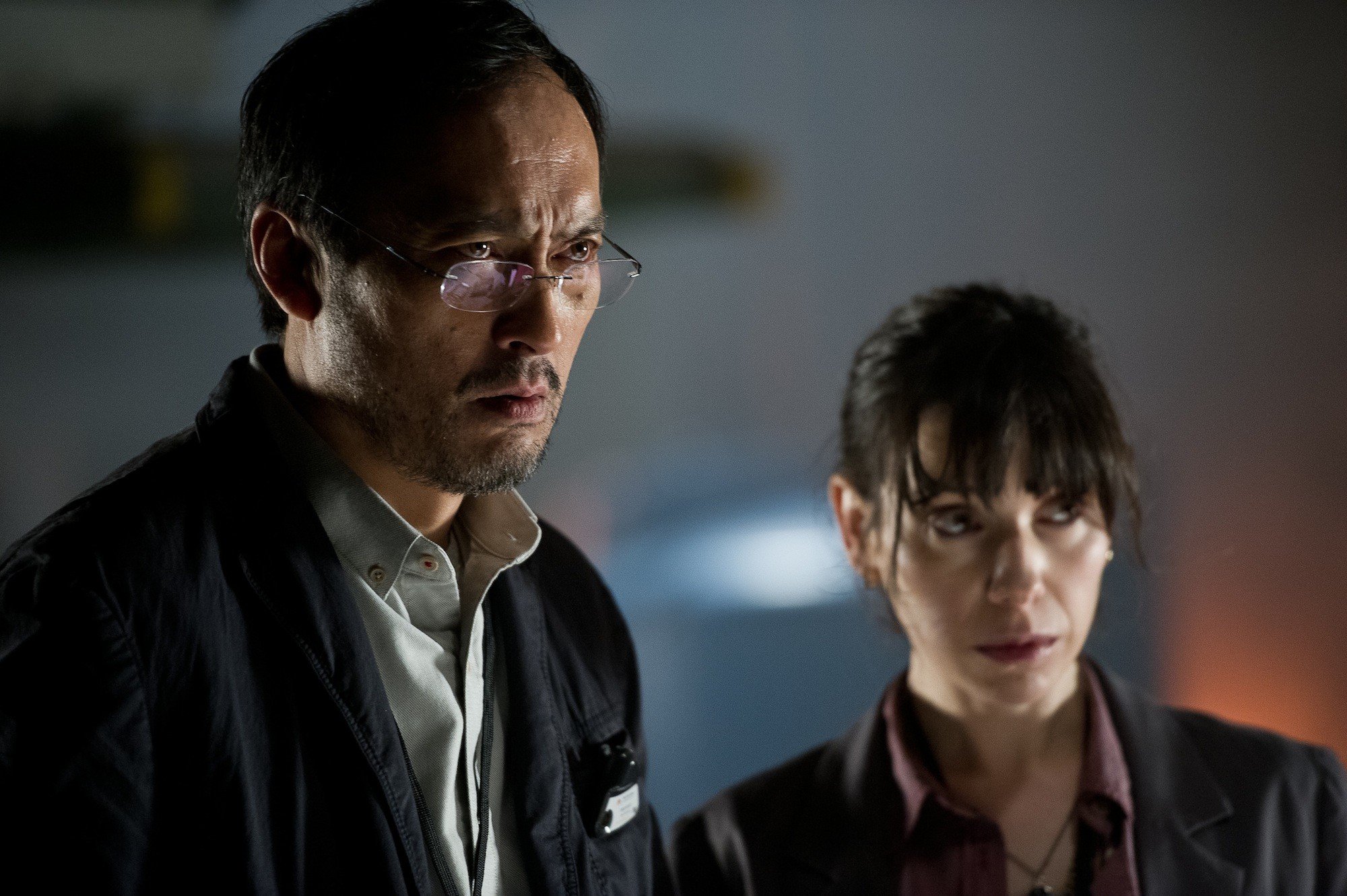 Ken Watanabe stars as Dr. Ichiro Serizawa and Sally Hawkins stars as Vivienne Graham in Warner Bros. Pictures' Godzilla (2014)
