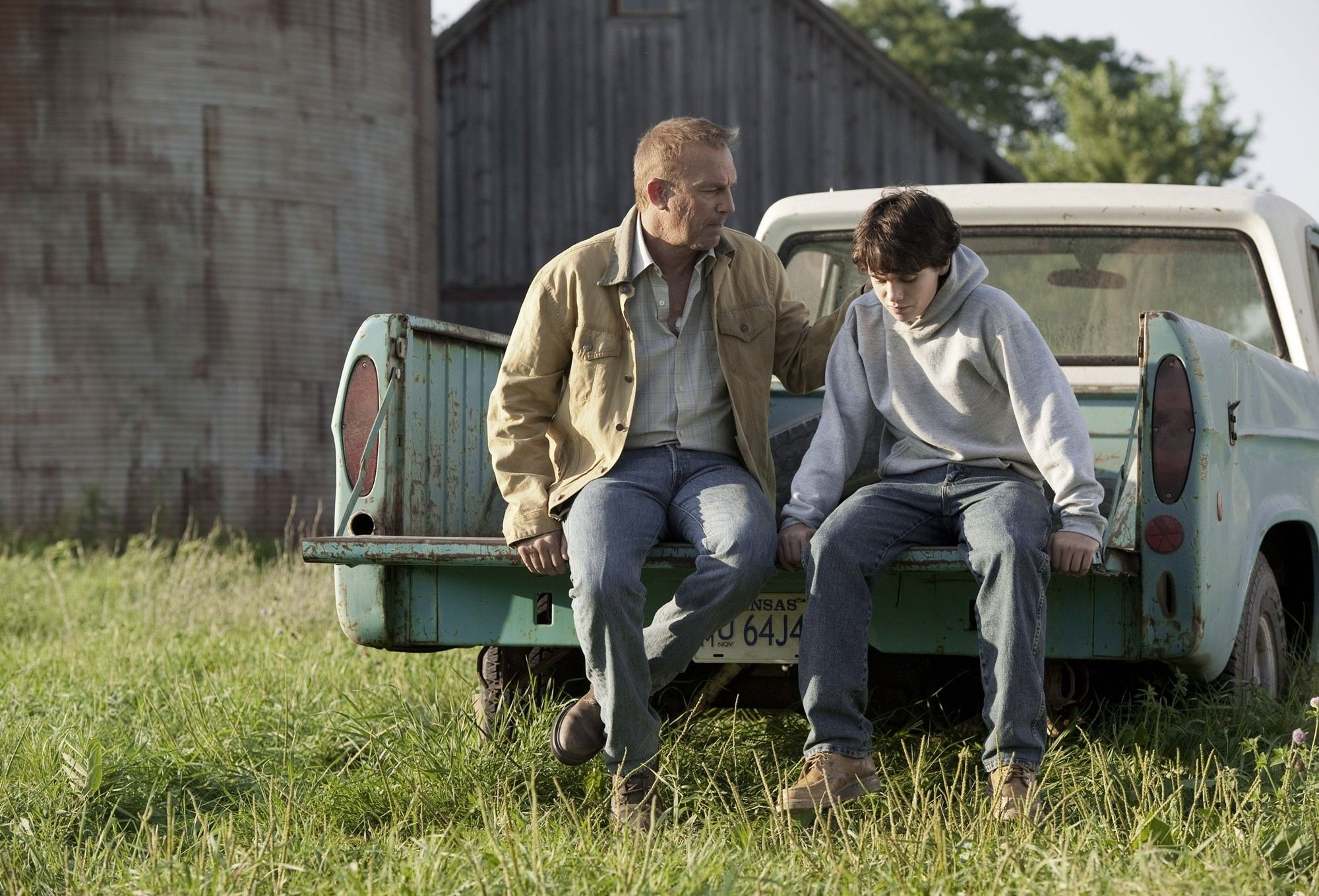 Kevin Costner stars as Jonathan Kent and Dylan Sprayberry stars as Clark Kent at 13 in Warner Bros. Pictures' Man of Steel (2013)