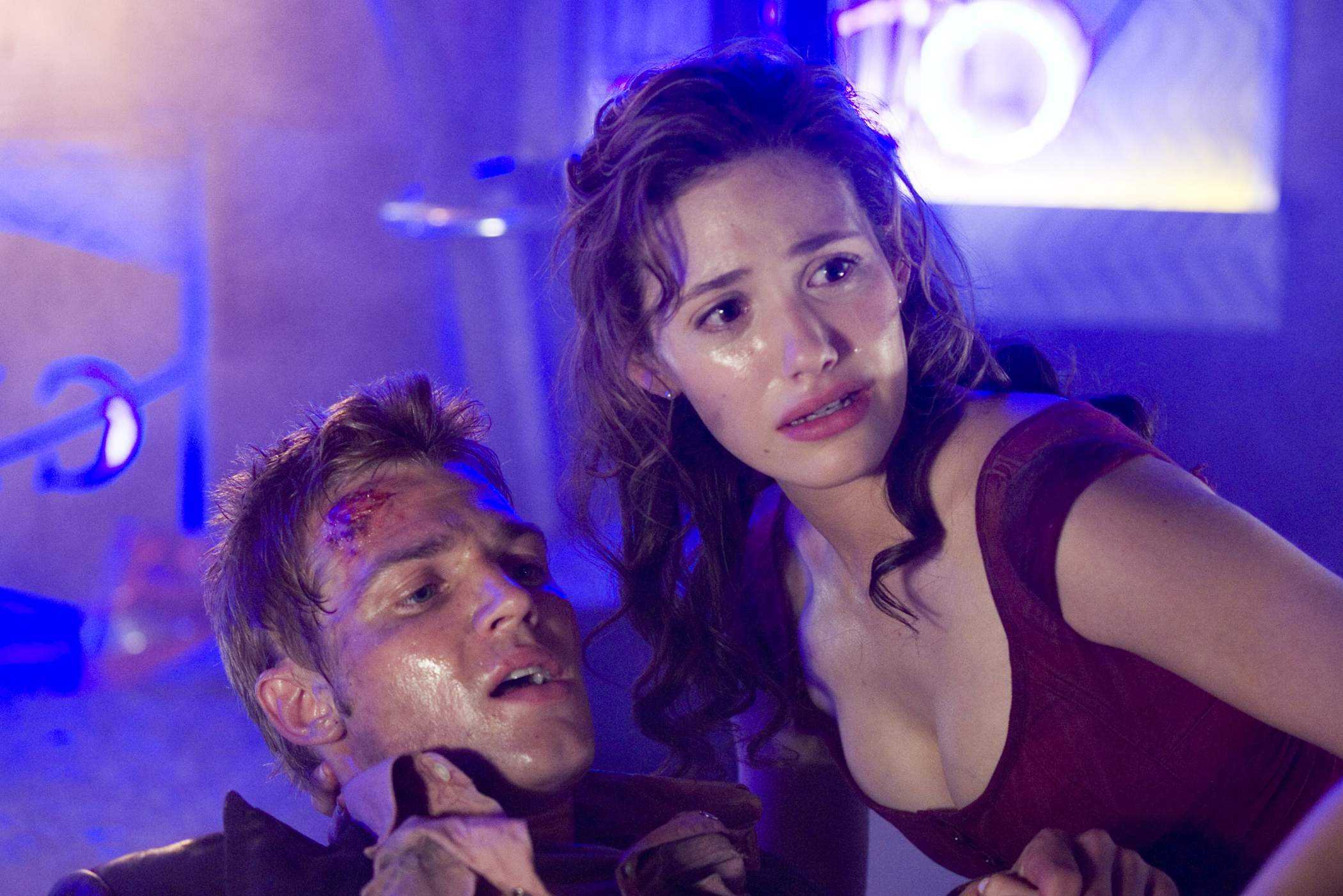 MIKE VOGEL as Christian and EMMY ROSSUM as Jennifer Ramsey in Warner Bros Pictures' Poseidon (2006)