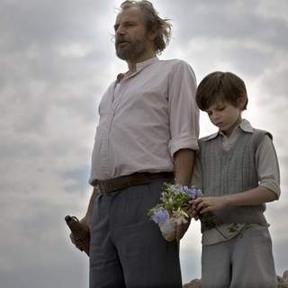 Rade Serbedzija as Athos and Robbie Kay as Young Jakob in Samuel Goldwyn Films' Fugitive Pieces (2008)