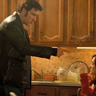 Clive Owen stars as Chris Pierzynski and Marion Cotillard stars as Monica in Roadside Attractions' Blood Ties (2014)