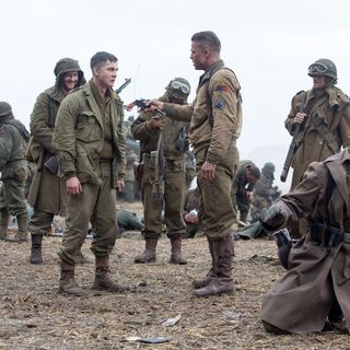 Logan Lerman stars as Norman Ellison and Brad Pitt stars as Wardaddy in Columbia Pictures' Fury (2014)