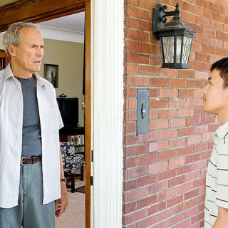 Clint Eastwood stars as Walt Kowalski and Bee Vang stars as Tao Vang Lor in Warner Bros. Pictures' Gran Torino (2008)