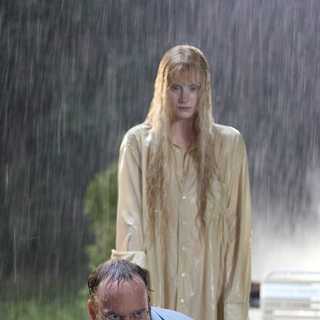 PAUL GIAMATTI as Cleveland Heep and BRYCE DALLAS HOWARD as Story star in Warner Bros. Pictures' sci-fi fantasy suspense thriller 