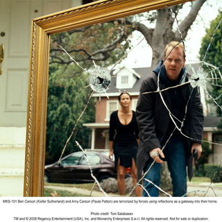 Paula Patton stars as Amy Carson and Kiefer Sutherland stars as Ben Carson in The 20th Century Fox's Mirrors (2008). Photo credit by Toni Salabasev.