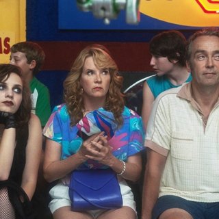 Lea Thompson stars as Mrs. Miracle and John Hannah stars as Mr. Miracle in Gravitas Ventures' Ping Pong Summer (2014)