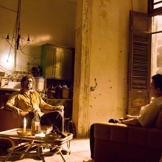 Michael Rispoli stars as Bob Sala and Johnny Depp stars as Paul Kemp in FilmDistrict's The Rum Diary (2011)