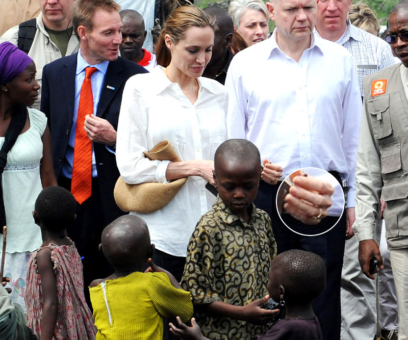 Angelina Jolie Appears Ditching Engagement Ring for Simple Gold Band