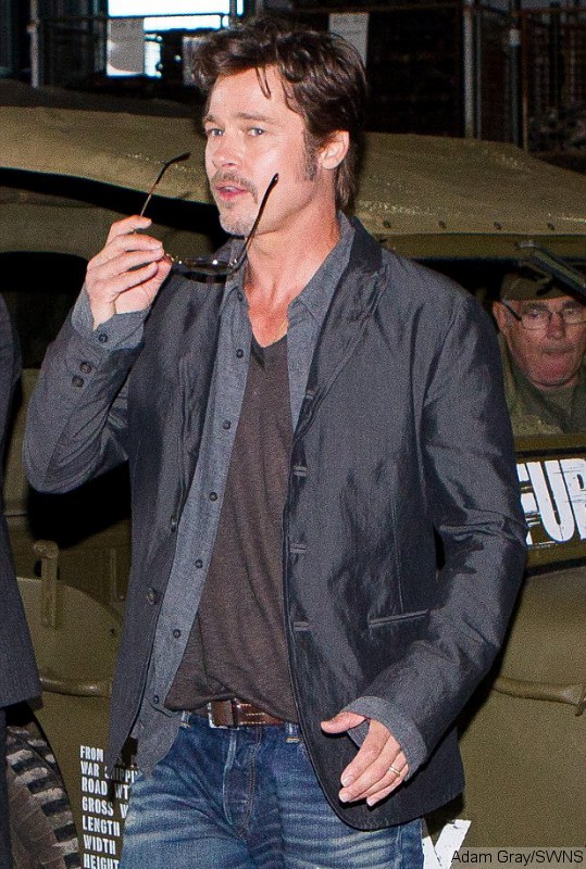 Brad Pitt Flashes Wedding Ring After Secret Nuptials With Angelina Jolie