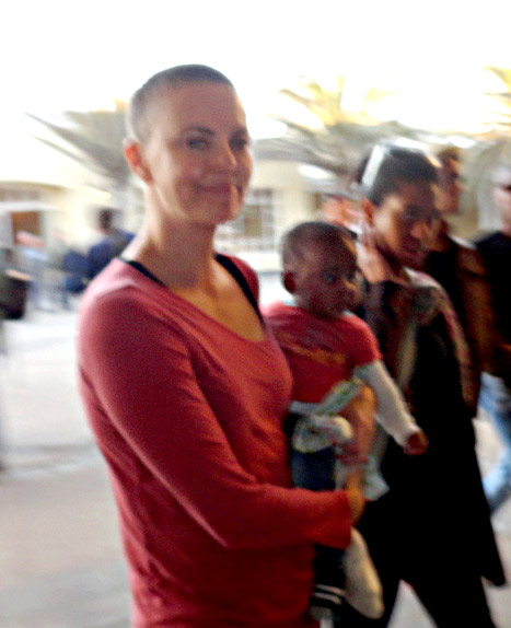 Charlize Theron Debuts Shaved Head in Namibia