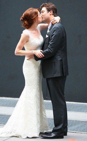 Ellie Kemper Pictured Wearing Wedding Gown and Kissing Her Husband