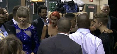 Justin Bieber and Selena Gomez Share Kiss at 2013 Billboard Music Award's Backstage
