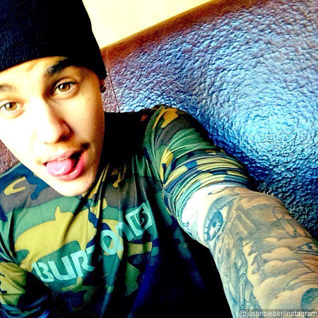 Justin Bieber Shares Snowboarding Photos, Says He's 'Worried Bout Nothing'