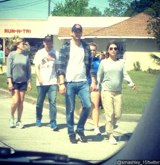 Mila Kunis Shows Growing Baby Bump During Louisiana Trip With Ashton Kutcher