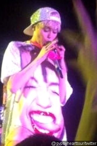 Miley Cyrus Chews a Fan's Underwear During Washington Show