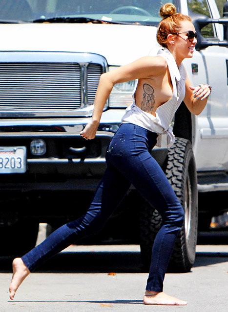 Miley Cyrus Flashes Side Boob While Going Out in Los Angeles