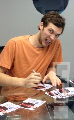 First Look at Phillip Phillips Signing Autographs After Leaving Hospital
