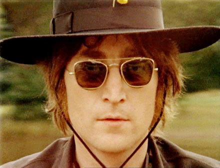 Near-Naked John Lennon Appeared Onstage With Toilet Seat