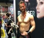 Drax Cosplayer Holding a Rocket Racoon Plushie
