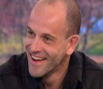 Jonny Lee Miller Celebrating After Completing Course as Firefighter