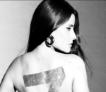 Nelly Furtado Opens Up on ADHD Diagnosis, Ditches Her Top for New Album Cover Art