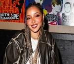 Tinashe Paddleboarding in Sizzling Outfit During Tropical Getaway