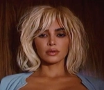 Kim Kardashian Releases Spooky Video Featuring Macaulay Culkin for 'Santa Baby' Cover