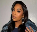 Ashanti Fuels Second Pregnancy Rumors by Avoiding Alcohol at New Year's Eve Party