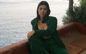 Kourtney Kardashian Flashes Major Sideboob in One-Piece Swimsuit