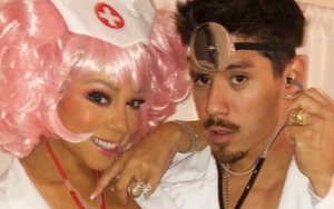 Mariah Carey Snuggles Up to BF Bryan Tanaka in Sexy Nurse Halloween Outfit