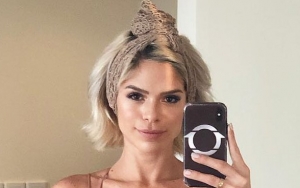 Model Michelle Lewin Bitten on the Butt by Pig During Beach Photo Shoot - Watch the Wild Video