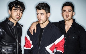 Watch: Jonas Brothers Take a Sip of Bird Saliva to Avoid Answering Awkward Question
