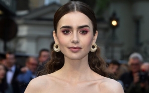 Lily Collins Looks Ethereal in White at 'Tolkien' U.K. Premiere