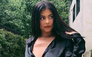 Kylie Jenner Debunks Pregnancy Speculation With Flat Stomach Video