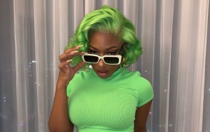 Megan Thee Stallion Roasts Hater for Trolling Her Height: 'What About It?'
